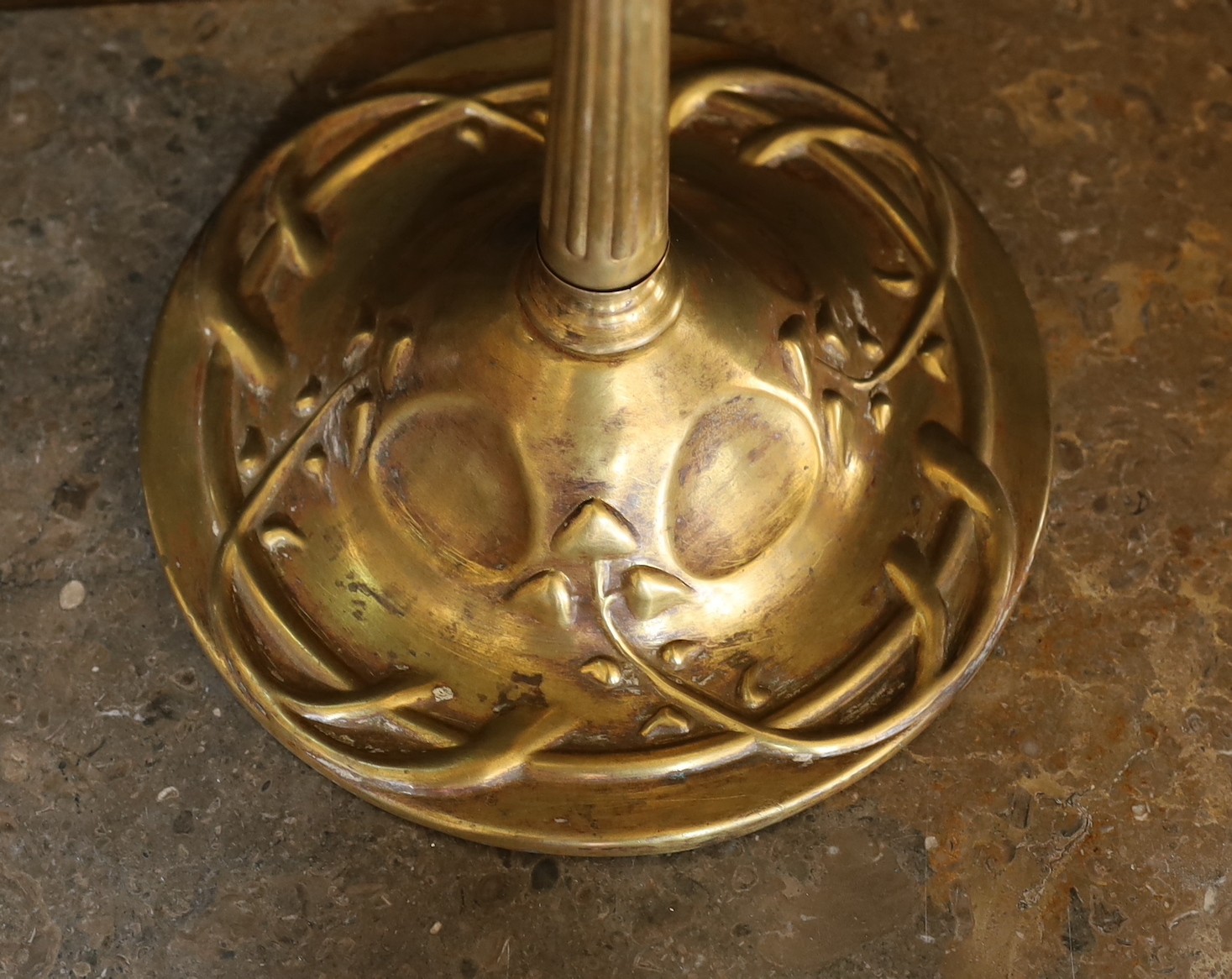 An Edwardian brass oil lamp, with etched glass globe, duplex mechanism and Art Nouveau embossed base, height to top of shade 58cm